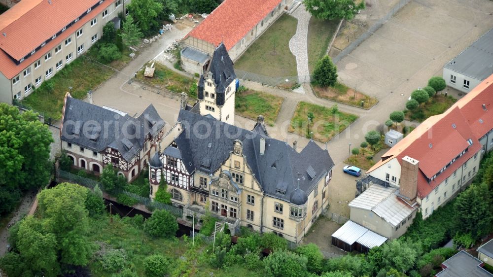 Quedlinburg from the bird's eye view: Church building of St. Wipertikirche with manor houses on Muehlgraben in Quedlinburg in the state Saxony-Anhalt, Germany