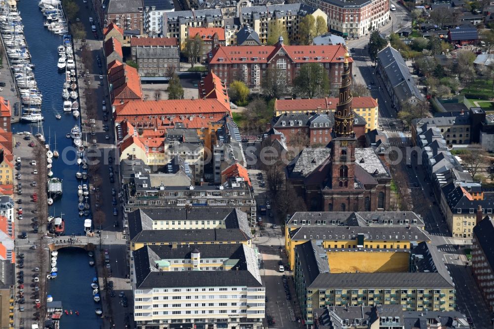 Aerial image Kopenhagen - Church tower and tower roof at the church building of Vor Frelsers Kirke Sonkt on Annae Gade in Copenhagen in Region Hovedstaden, Denmark