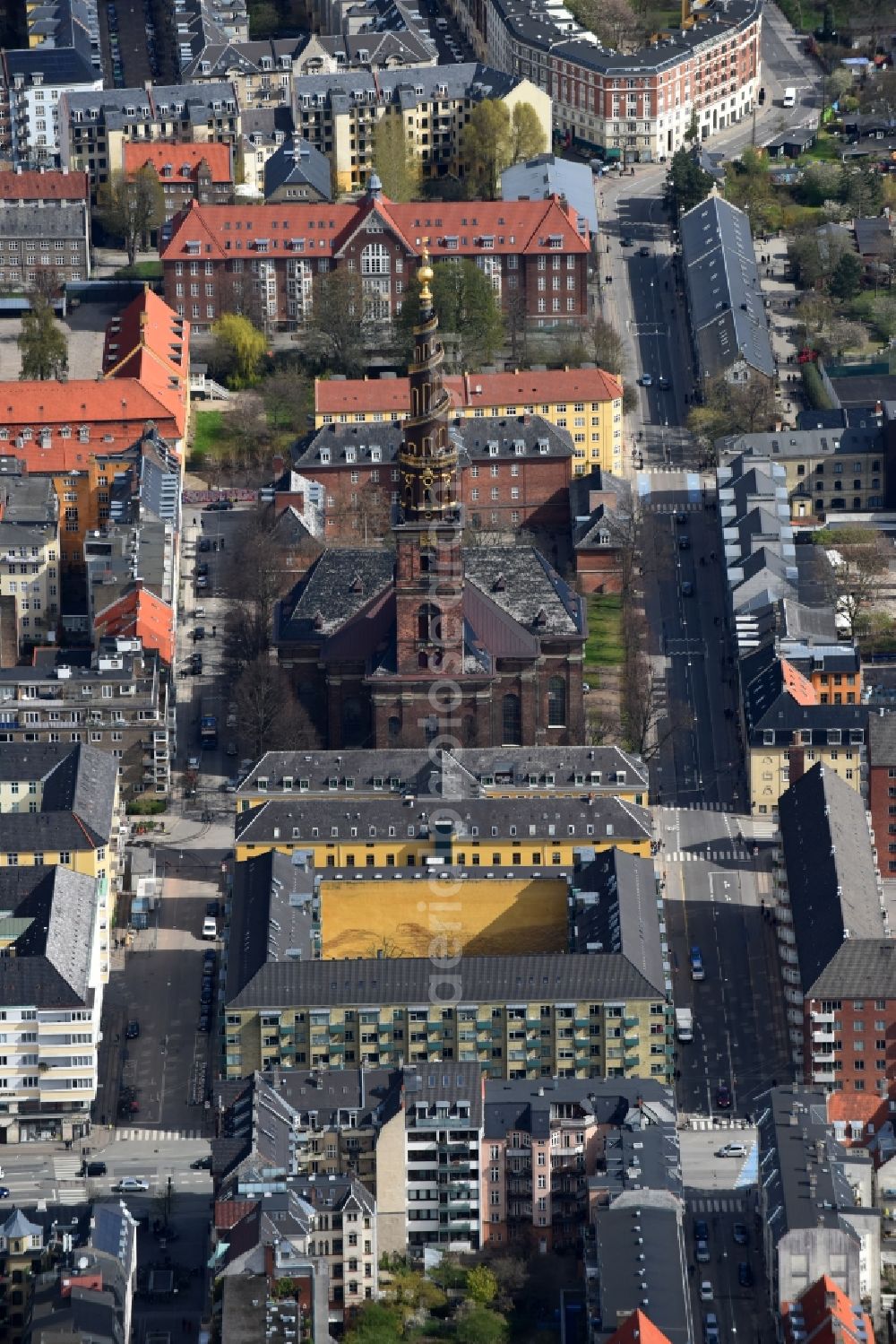 Aerial image Kopenhagen - Church tower and tower roof at the church building of Vor Frelsers Kirke Sonkt on Annae Gade in Copenhagen in Region Hovedstaden, Denmark