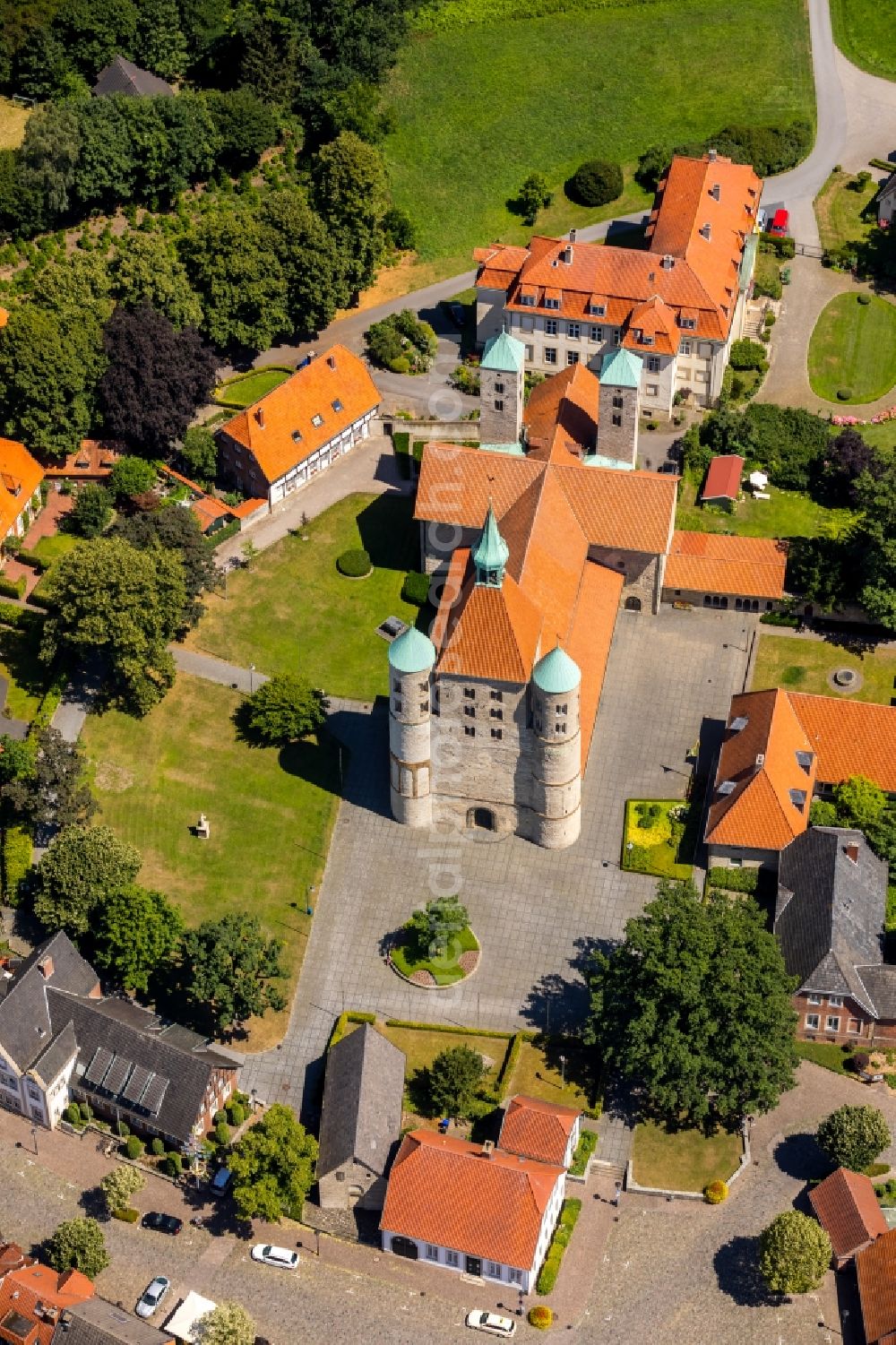 Freckenhorst from above - Church tower and tower roof at the church building of Schloss Freckenhorst on Stiftshof in Freckenhorst in the state North Rhine-Westphalia, Germany