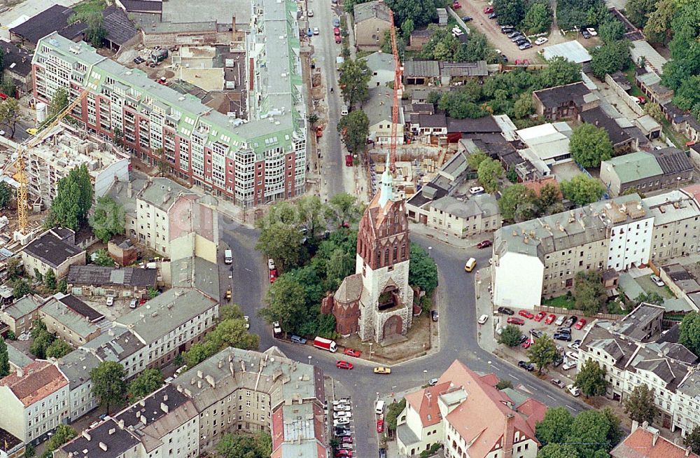 Berlin from the bird's eye view: Church tower and tower roof at the church building of on Kreisverkehr of Mirbachplatz in the district Weissensee in Berlin, Germany