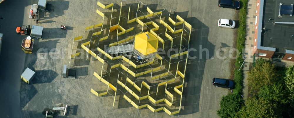 Aerial image Cloppenburg - Fair - event location at festival with yellow labyrinth and maze in Cloppenburg in the state Lower Saxony