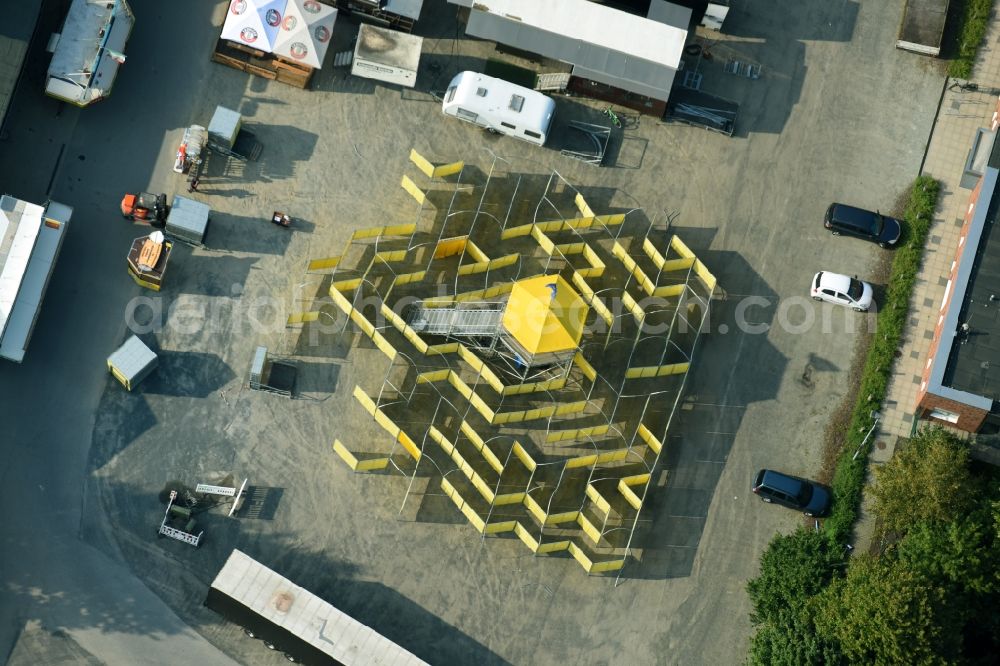 Aerial photograph Cloppenburg - Fair - event location at festival with yellow labyrinth and maze in Cloppenburg in the state Lower Saxony