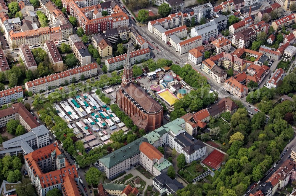 München from above - Fair - and Rummel- event grounds at Mariahilfplatz on church building in the Mariahilf Church in Neighborhood Au in Munich in Bavaria