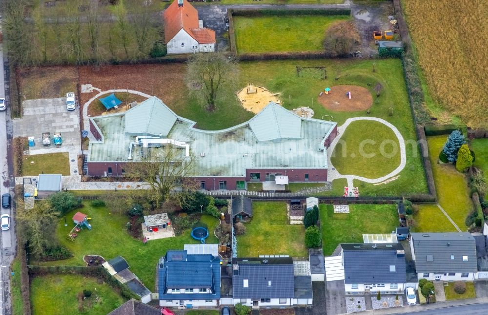 Opherdicke from the bird's eye view: Kindergarten building and Nursery school on Unnaer Strasse in Opherdicke in the state North Rhine-Westphalia, Germany