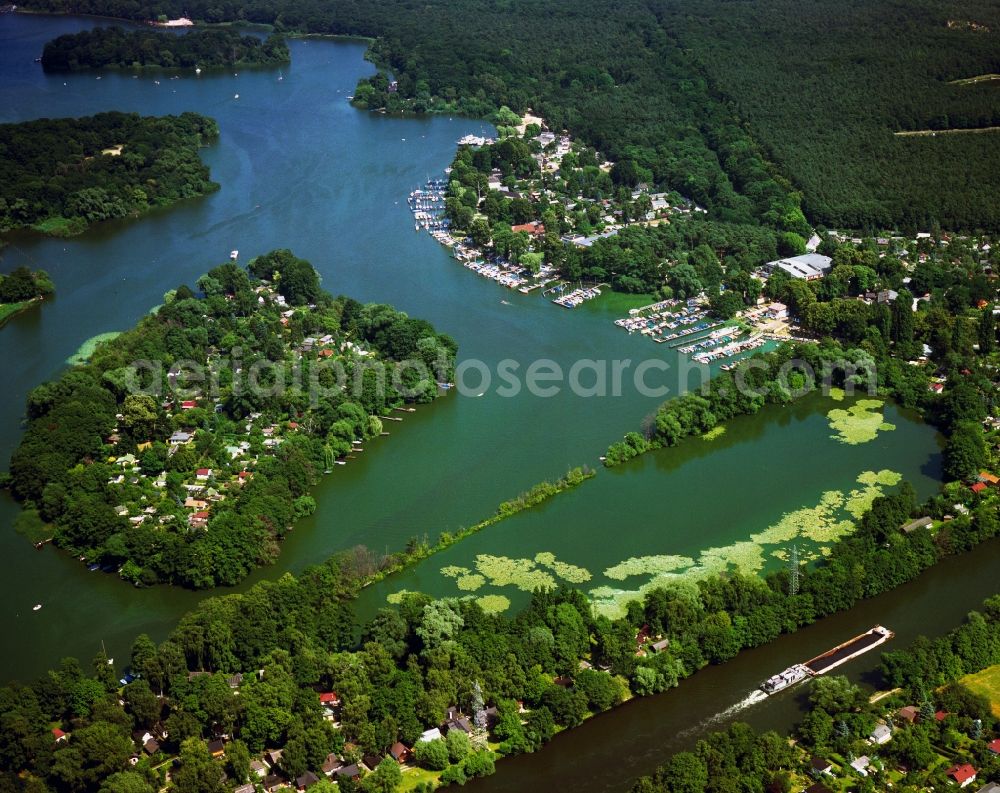 Berlin from the bird's eye view: Bay Kleine Malche in the Tegel part of the district of Reinickendorf in Berlin. The Kleine Malche is the Southern most bay of Lake Tegel. It is located on the Berlin-Spandau ship canal and is used as a protected fish spawning location