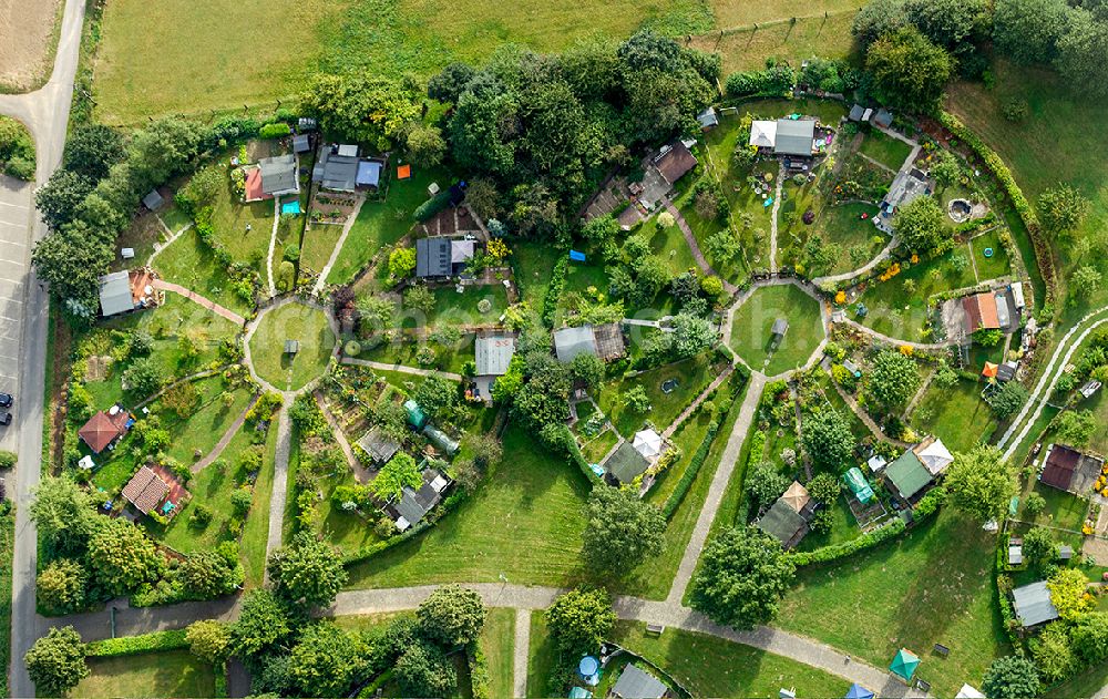 Aerial photograph Witten - Blick auf die Kleingartenanlage Am Heuweg in Witten im Bundesland Nordrhein-Westfalen NRW. Zu sehen sind in Rondellen angelegte Parzellen. Verantwortlich ist Kleingartnverein Am Heuweg e.V.// View at the garden allotment at Heuweg in Witten in the federal state North Rhine-Westphalia. To see are in roundels created parcels. Responsible is the Kleingartenverein Am Heuweg e.V.