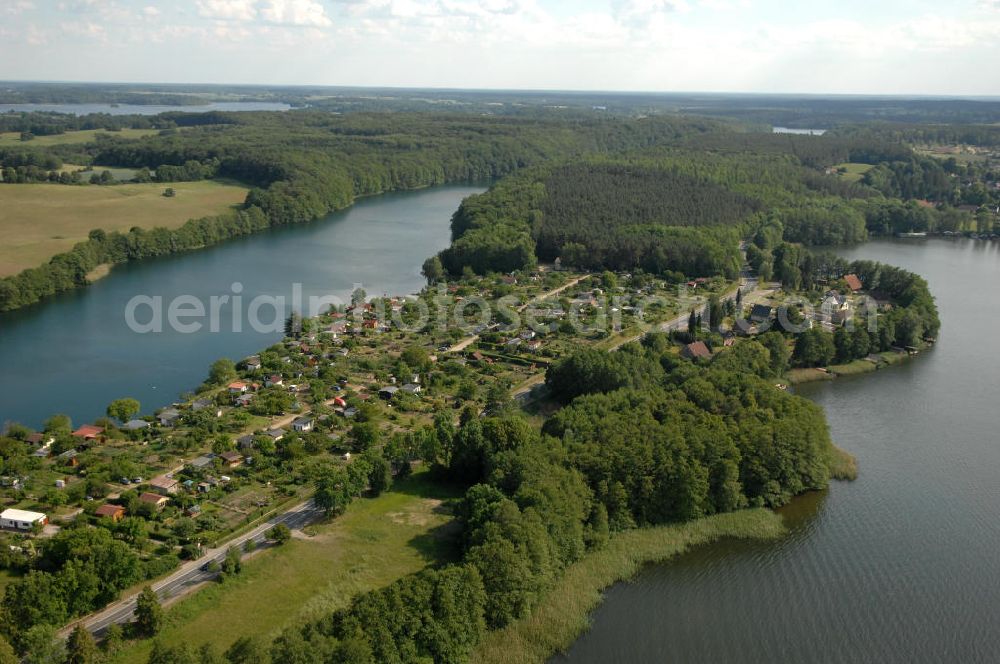 Aerial photograph Feldberg - Blick auf eine Kleingarten-Siedlung an der Prenzlauer Straße zwischen dem Haussee und dem See Schmaler Luzin in Feldberg - Mecklenburg-Vorpommern MV. View of an allot settlement / allotment garden at the Prenzlauer Street between the Haussee and the lake Schmaler Luzin in Feldberg - Mecklenburg-Western Pomerania.