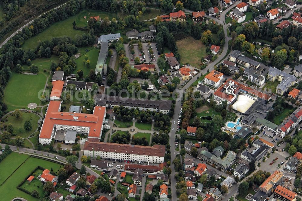 Bad Tölz from above - Hospital grounds of the hospital Asklepios Klinik city and Alpamare water park in Bad Toelz in the state Bavaria. The closed water park and Alpamare Thermal Spa was the first wave pool in Germany and distinguishes itself through its large water slides that extend partially outside the building