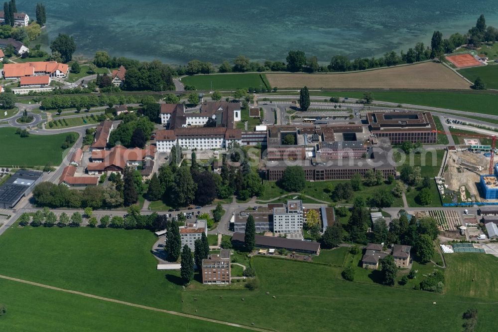 Münsterlingen from above - Hospital grounds of the Clinic Kantonsspital Muensterlingen in Muensterlingen in the canton Thurgau, Switzerland