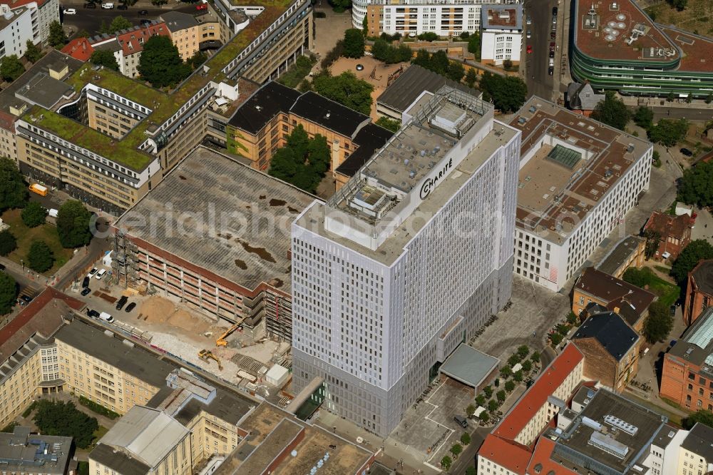 Berlin from the bird's eye view: Hospital grounds of the Clinic with construction site on Robert-Koch-Platz corner Luisenstrasse in the district Mitte in Berlin, Germany