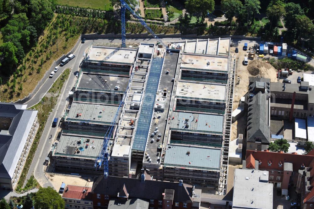 Aerial image Brandenburg - Blick auf die Baustelle zum Erweiterungsbau des Krankenhaus Brandenburg an der Havel. Hier entstehen u.a. durch die Firma BATEG Ingenieurbau ein neues Bettenhaus auf der Grundlage des Entwurfes des Architekturbüros Heinle, Wischer und Partner, Berlin. View at the construction site for the new building of the hospital Brandenburg. The new hospital was built by the engeneering firm BATEG on the basis of the design by the architects Heinle, Wischer and Partner, Berlin.