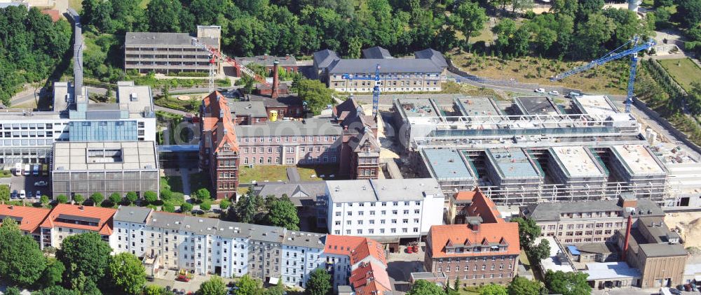 Aerial photograph Brandenburg - Blick auf die Baustelle zum Erweiterungsbau des Krankenhaus Brandenburg an der Havel. Hier entstehen u.a. durch die Firma BATEG Ingenieurbau ein neues Bettenhaus auf der Grundlage des Entwurfes des Architekturbüros Heinle, Wischer und Partner, Berlin. View at the construction site for the new building of the hospital Brandenburg. The new hospital was built by the engeneering firm BATEG on the basis of the design by the architects Heinle, Wischer and Partner, Berlin.