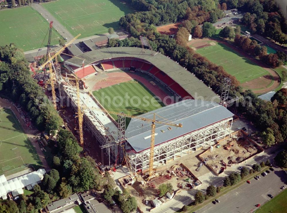 Aerial image Köln - Umbau des 1923 erbauten Müngersdorfer Stadion. Das neue Stadion wird 2003 fertiggestellt und bietet knapp 51.000 Zuschauer Platz. Architekt: Marg, Gerkan u. Partner, RheinEnergieStadion, Aachener Straße, 50933 Köln, Telefon: 02 21/4 98 36