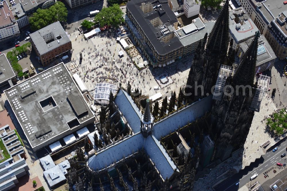 Köln from above - View of the Cologne Cathedral in the center of Cologne, near central station. The Cologne Cathedral is a Roman Catholic church in the Gothic style in Cologne and the Cathedral of the Archdiocese of Cologne. It is the second highest church building in Europe and the third highest in the world