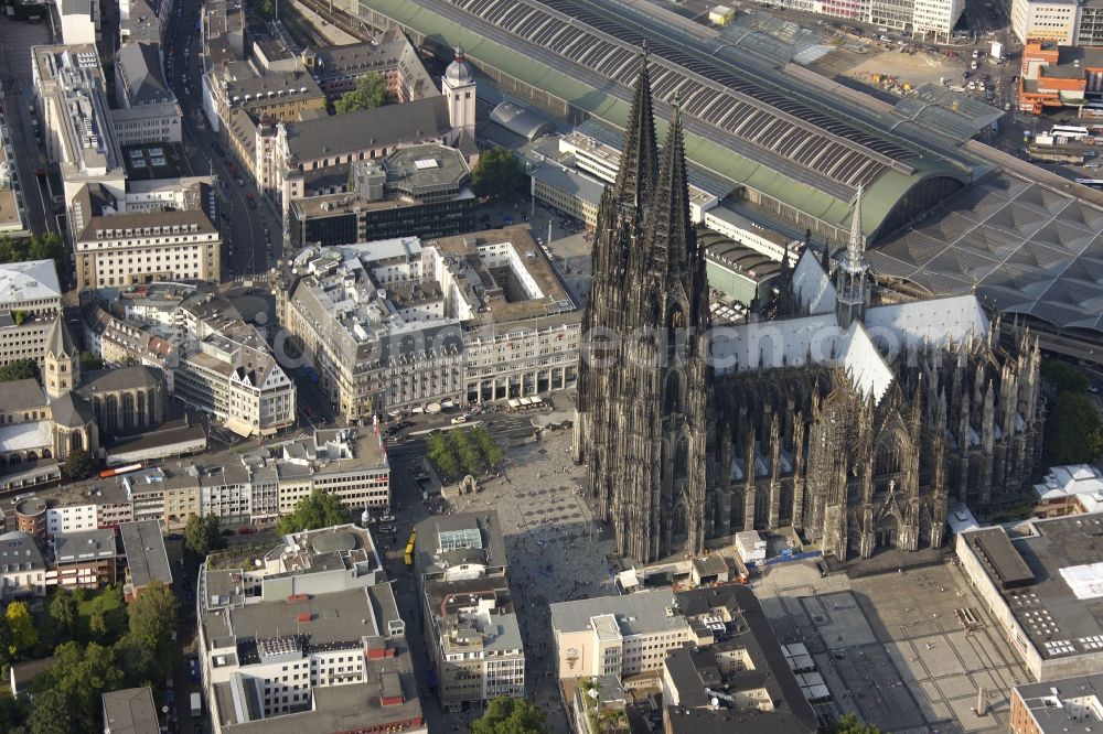 Köln from above - View of the Cologne Cathedral in the center of Cologne, near central station. The Cologne Cathedral is a Roman Catholic church in the Gothic style in Cologne and the Cathedral of the Archdiocese of Cologne. It is the second highest church building in Europe and the third highest in the world