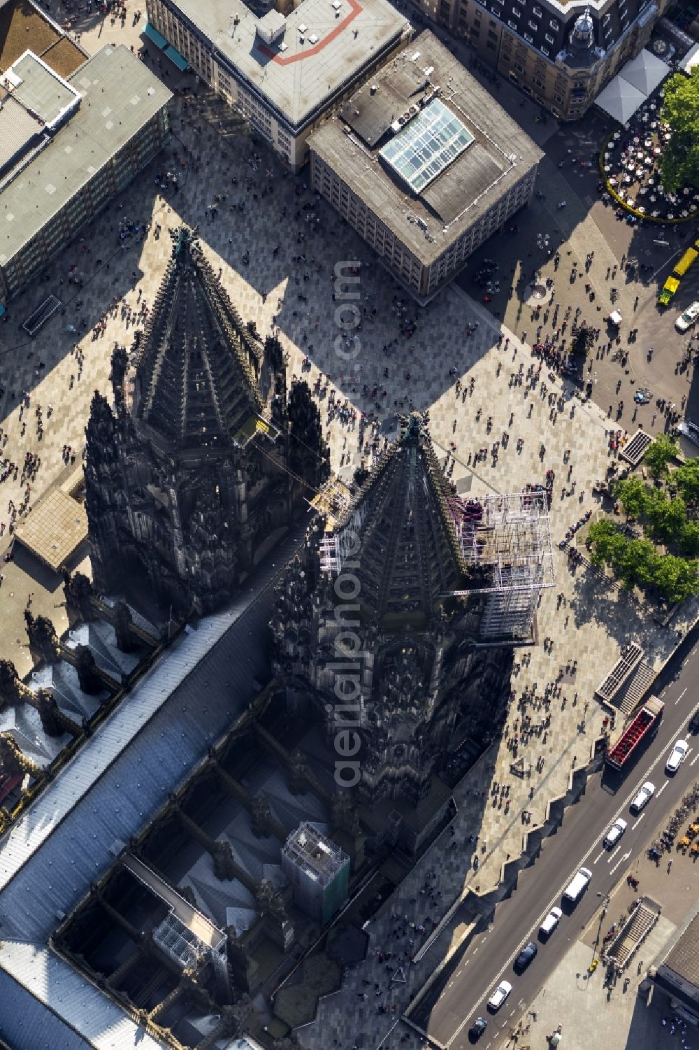 Köln from the bird's eye view: View of the Cologne Cathedral in the center of Cologne, near central station. The Cologne Cathedral is a Roman Catholic church in the Gothic style in Cologne and the Cathedral of the Archdiocese of Cologne. It is the second highest church building in Europe and the third highest in the world