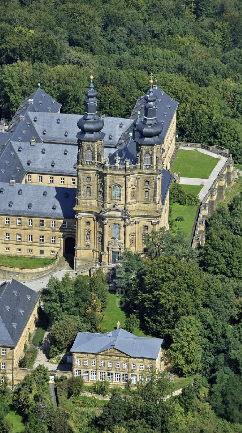 Aerial photograph Bad Staffelstein - Blick auf das Kloster Banz,einem ehemaligen Benediktinerkloster. Seit 1978 ist das Kloster im Besitz der CSU-nahen Hanns-Seidel-Stiftung und dient als Tagungsstätte. Die gegründete Benediktiner-Abtei war bis zur Säkularisation 1803 das älteste Kloster am Obermain. View of the Banz Abbey, a former Benedictine monastery. Since 1978, the monastery owned by the CSU-affiliated Hanns-Seidel Foundation and serves as a meeting place. The Benedictine abbey was founded in 1073 and until the secularisation in 1803 the oldest monastery in the Upper Main.