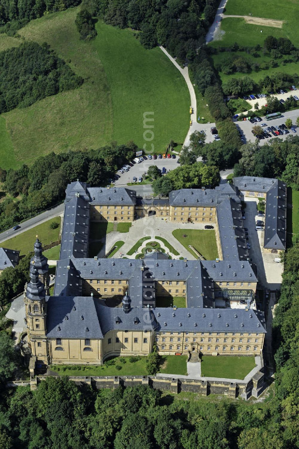 Bad Staffelstein from above - Blick auf das Kloster Banz,einem ehemaligen Benediktinerkloster. Seit 1978 ist das Kloster im Besitz der CSU-nahen Hanns-Seidel-Stiftung und dient als Tagungsstätte. Die gegründete Benediktiner-Abtei war bis zur Säkularisation 1803 das älteste Kloster am Obermain. View of the Banz Abbey, a former Benedictine monastery. Since 1978, the monastery owned by the CSU-affiliated Hanns-Seidel Foundation and serves as a meeting place. The Benedictine abbey was founded in 1073 and until the secularisation in 1803 the oldest monastery in the Upper Main.