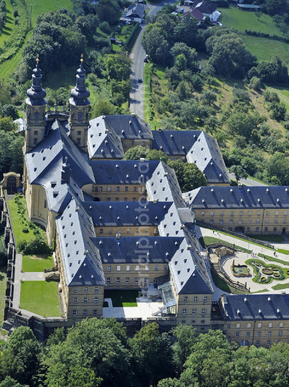 Aerial photograph Bad Staffelstein - Blick auf das Kloster Banz,einem ehemaligen Benediktinerkloster. Seit 1978 ist das Kloster im Besitz der CSU-nahen Hanns-Seidel-Stiftung und dient als Tagungsstätte. Die gegründete Benediktiner-Abtei war bis zur Säkularisation 1803 das älteste Kloster am Obermain. View of the Banz Abbey, a former Benedictine monastery. Since 1978, the monastery owned by the CSU-affiliated Hanns-Seidel Foundation and serves as a meeting place. The Benedictine abbey was founded in 1073 and until the secularisation in 1803 the oldest monastery in the Upper Main.