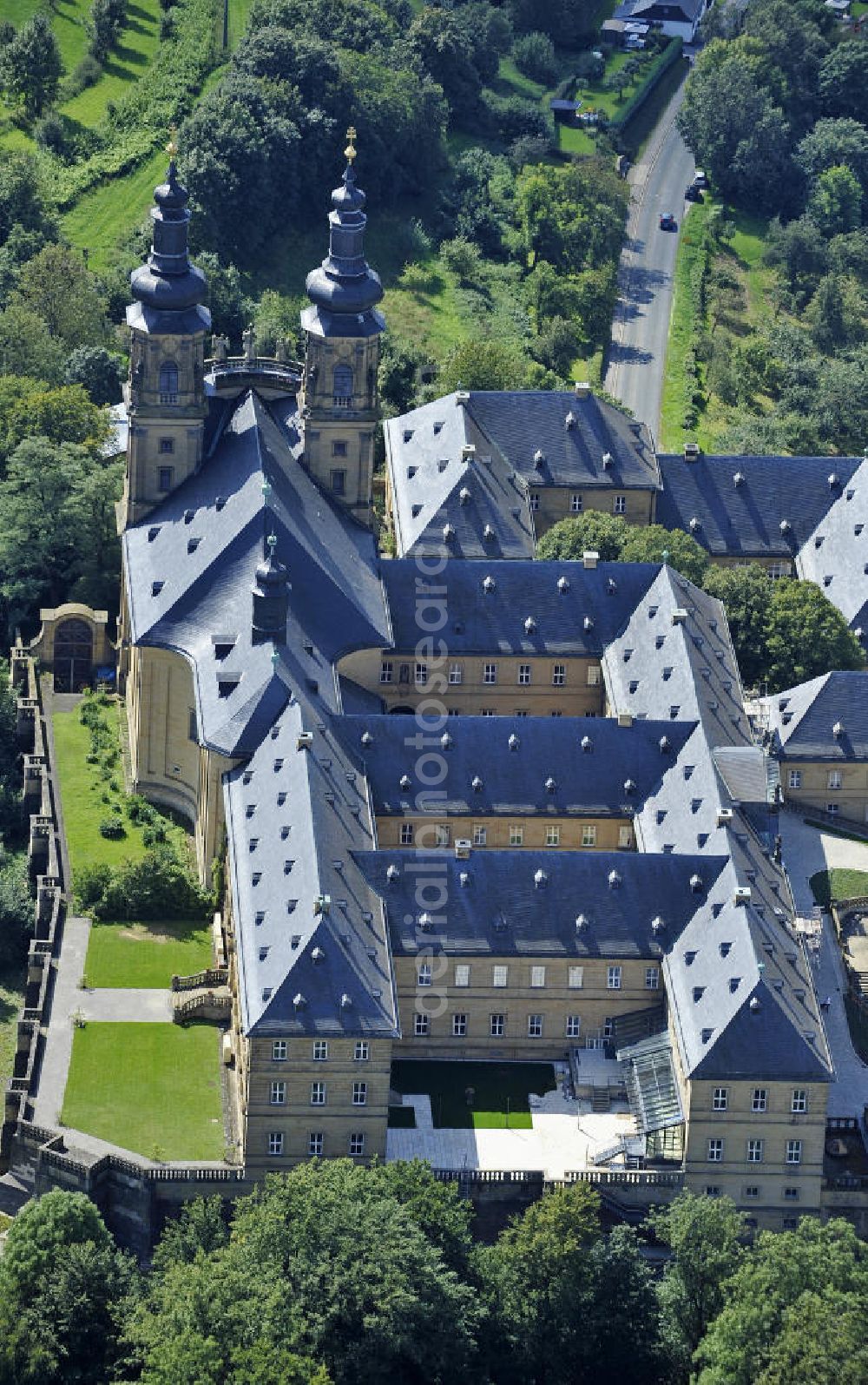 Bad Staffelstein from above - Blick auf das Kloster Banz,einem ehemaligen Benediktinerkloster. Seit 1978 ist das Kloster im Besitz der CSU-nahen Hanns-Seidel-Stiftung und dient als Tagungsstätte. Die gegründete Benediktiner-Abtei war bis zur Säkularisation 1803 das älteste Kloster am Obermain. View of the Banz Abbey, a former Benedictine monastery. Since 1978, the monastery owned by the CSU-affiliated Hanns-Seidel Foundation and serves as a meeting place. The Benedictine abbey was founded in 1073 and until the secularisation in 1803 the oldest monastery in the Upper Main.