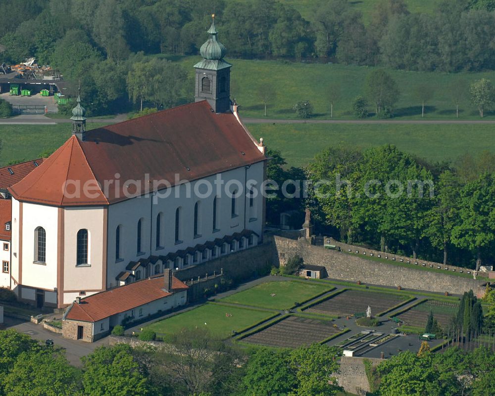 Fulda from above - Blick auf das Kloster Freundenberg mit der barocken Klosterkirche. Das Kloster der Franziskaner steht auf dem gleichnamigen Berg und wurde schon im 9. Jahrhundert gegründet. View of the Monastery Freudenberg with the baroque monastery church. The Abbey was founded in the 9th Century.