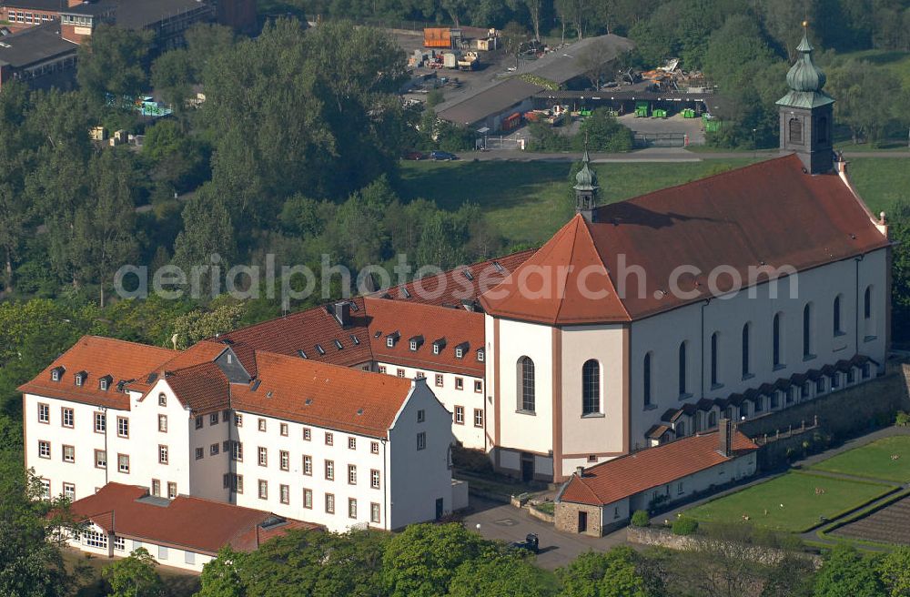 Aerial photograph Fulda - Blick auf das Kloster Freundenberg mit der barocken Klosterkirche. Das Kloster der Franziskaner steht auf dem gleichnamigen Berg und wurde schon im 9. Jahrhundert gegründet. View of the Monastery Freudenberg with the baroque monastery church. The Abbey was founded in the 9th Century.