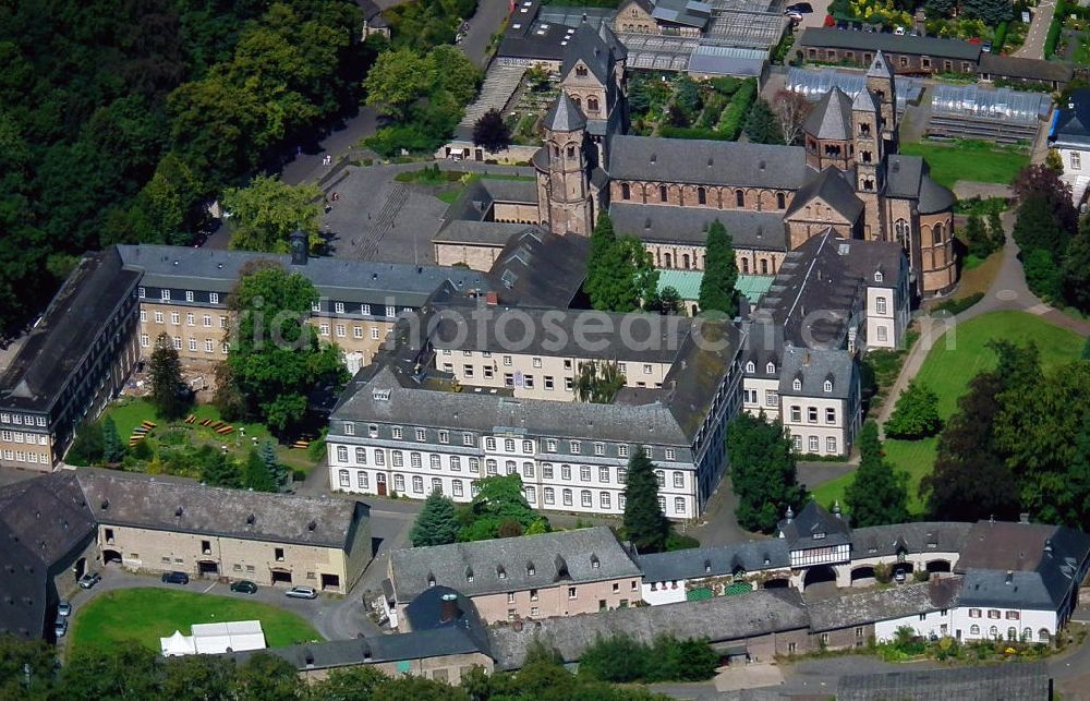 Aerial photograph Glees - Die hochmittelalterliche Klosteranlage Maria Laach, in der schon 1933 Konrad Adenauer Zuflucht vor den Nationalsozialisten fand, liegt nördlich von Mendig in der Eifel auf der Markung der Ortsgemeinde Enkirch Glees im Landkreis Ahrweiler, Rheinland-Pfalz. The high middle ages monastery complex Maria Laach, where Konrad Adenauer found refuge from the national socialists in 1933, is located north of Mendig in the Eifel on the marking of the community Glees in the administrative district Ahrweiler, Rhineland-Palatinate.