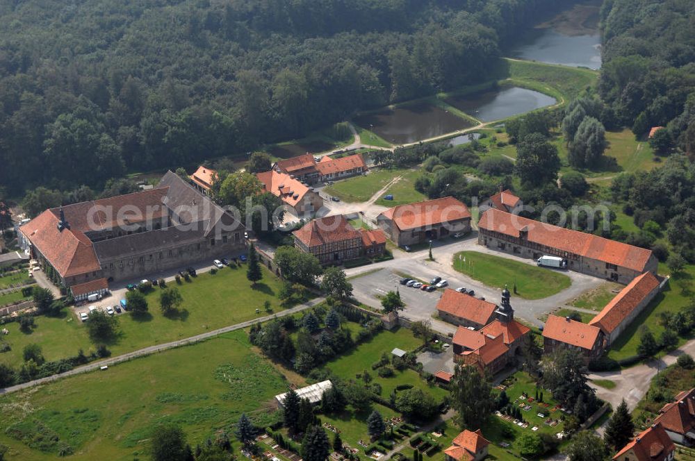 Michaelstein (Blankenburg) from the bird's eye view: Strasse der Romanik: Blick auf das Klostergelände Michaelstein, welches heute Heimstatt des Telemann-Kammerorchesters Sachsen-Anhalt ist. Seine Klausurräume werden für Seminare und Konzertveranstaltungen, als Bibliothek, Verwaltung und Musikinstrumentenmuseum genutzt. Kontakt: Stiftung Kloster Michaelstein, Postfach 24, 38881 Blankenburg; Telefon: 03944/ 90 30-0; Telefax: 03944/ 90 30 30; Homepage: