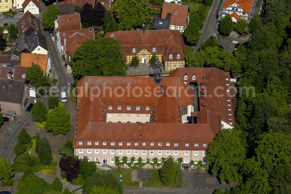 Aerial image Rietberg - The former Franciscan monastery on the Ems in Rietberg in the Klosterstrasse in the state North Rhine-Westphalia. Behind, the building of the old Progymnasium is located on the Emsstrasse. It's a half-timbered house