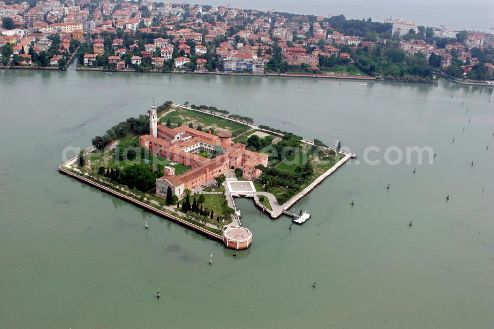 Aerial photograph Venedig - Blick auf das Kloster San Lazarro degli Armeni, eine Insel in der Lagune von Venedig. Ursprünglich diente die Insel als Krankenhaus für Leprakranke. Im 18. Jahrhundert siedelten sich armenische Mönche an und gründeten das Kloster, das als Mutterhaus des armenischen Mechitaristenordens gilt. Im Hintergrund ist die Insel Lido zu sehen. View to the monastery San Lazarro degli Armeni, at an small island in the lagoon of Venice. Primeordial the island was used as an hospital for leper. In the 18. century armenian monks setteld down there and built the monastery. In the background is the island Lido recognizable.