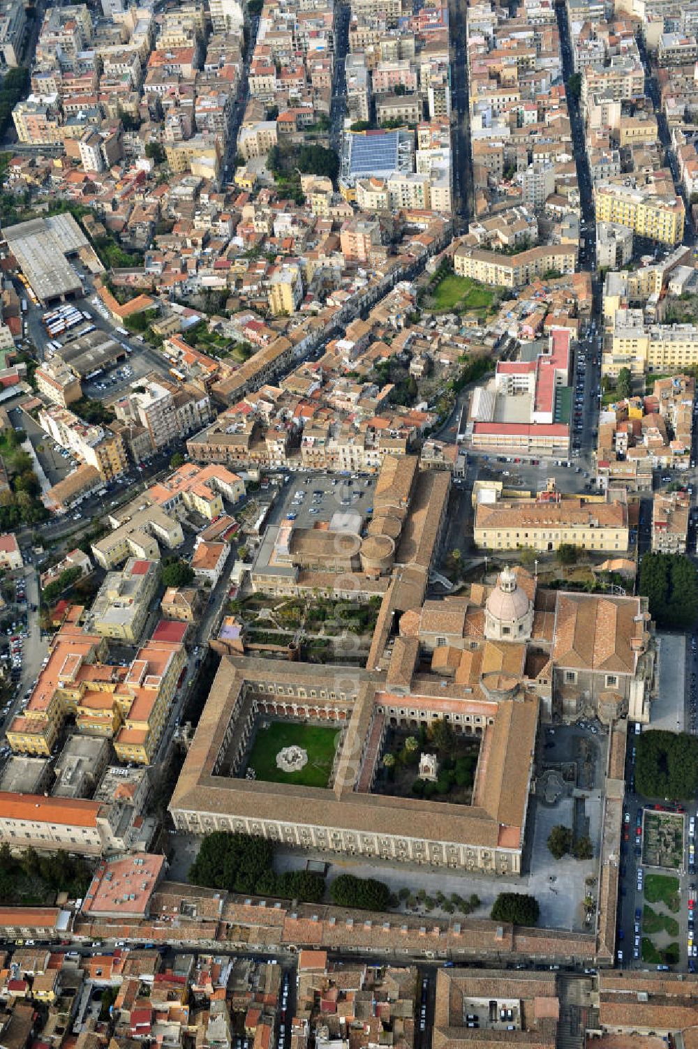 Aerial image Catania Sizilien - The monastery was originally a Benedictine monastery of San Nicola and now houses part of the University of Catania, with the adjoining unfinished church of San Nicola l'Arena Cantania on Sicily in Italy