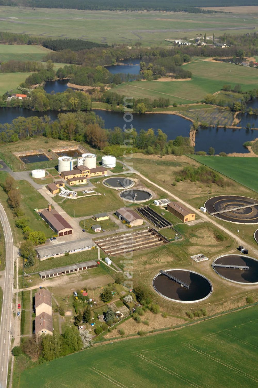 Aerial photograph Brandenburg an der Havel - Blick auf die Kläranlage der BRAWAG GmbH am Briester Weg. Das Unternehmen wurde 1993 gegründet, seit 1998 ist es der Betreiber der öffentlichen Abwasseranlagen der Stadt Brandenburg an der Havel. Die BRAWAG gehört zu der Stadtwerke Brandenburg an der Havel GmbH. Kontakt: BRAWAG GmbH, Upstallstraße 25, 14772 Brandenburg an der Havel