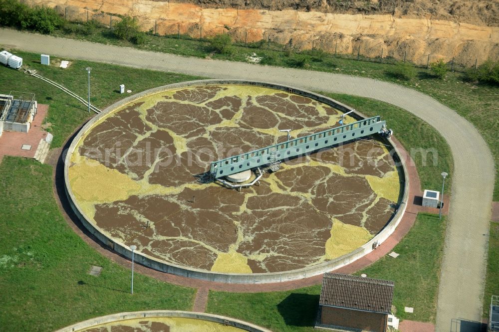 Aerial photograph Jessen (Elster) - Sewage works, basin and purification steps for waste water treatment in Jessen (Elster) in the state Saxony-Anhalt. The compound and facilities are located in a forest in the West of Essen