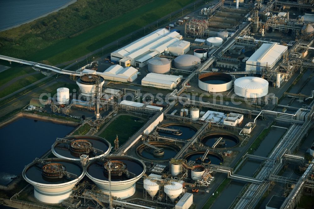 Stade from above - Sewage works Basin and purification steps for waste water treatment on the banks of the Elbe in Stade in the state Lower Saxony