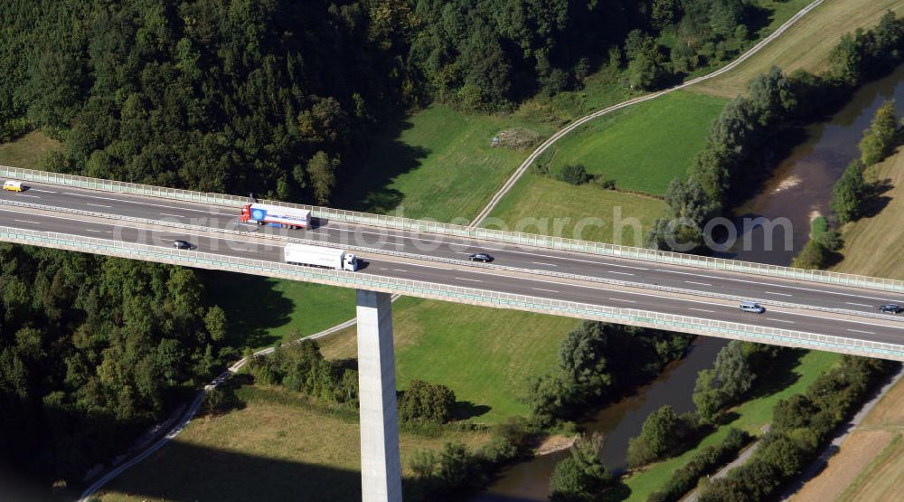 Aerial photograph Braunsbach - Blick auf die Kochertalbrücke. Die Brücke ist mit einer maximalen Höhe von 185 m über Grund die höchste Talbrücke in Deutschland. Mit 178 m Höhe weist das Bauwerk außerdem weltweit die höchsten Brückenpfeiler einer Balkenbrücke auf. Die Brücke überführt bei Geislingen am Kocher die vierspurige Bundesautobahn / Autobahn 6 über das Kochertal.