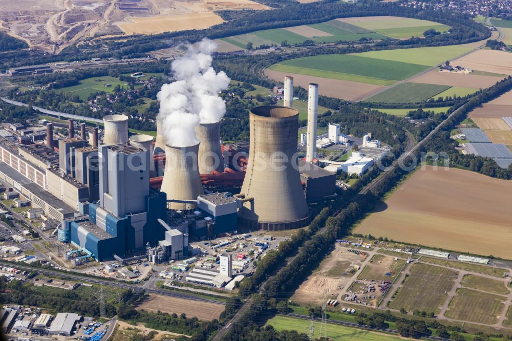 Aerial photograph Niederaußem - Coal power plants of the RWE Power AG Kraftwerk Niederaussem in the district Niederaussem in Bergheim in the state North Rhine-Westphalia, Germany