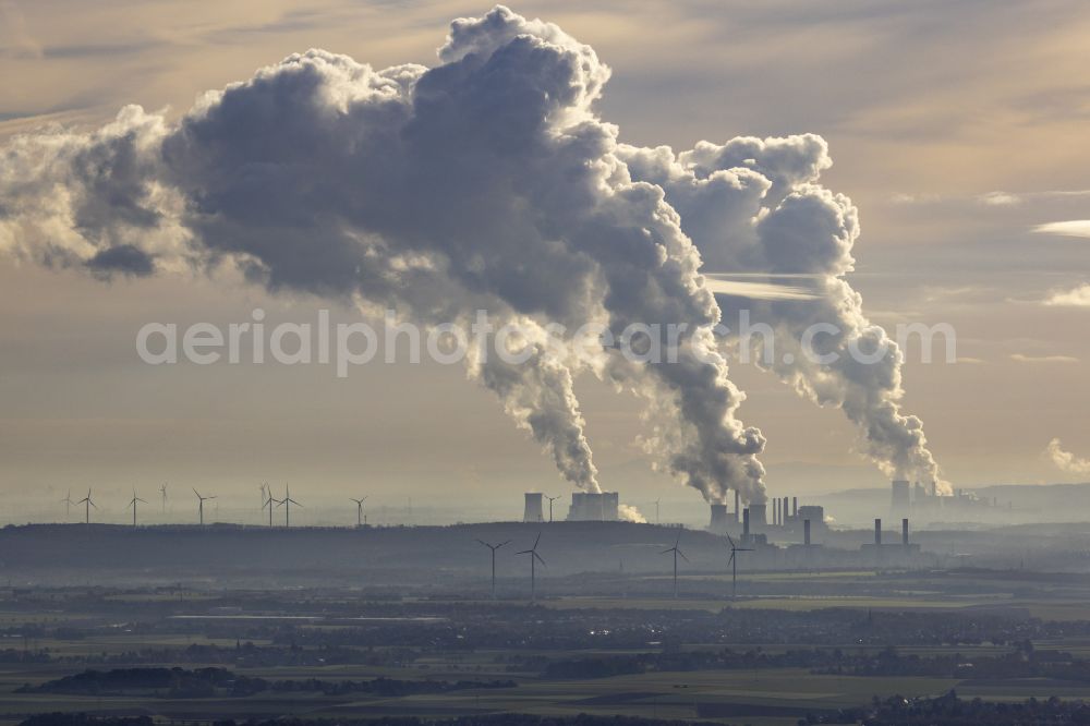 Aerial image Niederaußem - Exhaust clouds from the coal-fired power plants of the RWE Power AG Niederaussem power plant in the Niederaussem district of Bergheim in the federal state of North Rhine-Westphalia, Germany