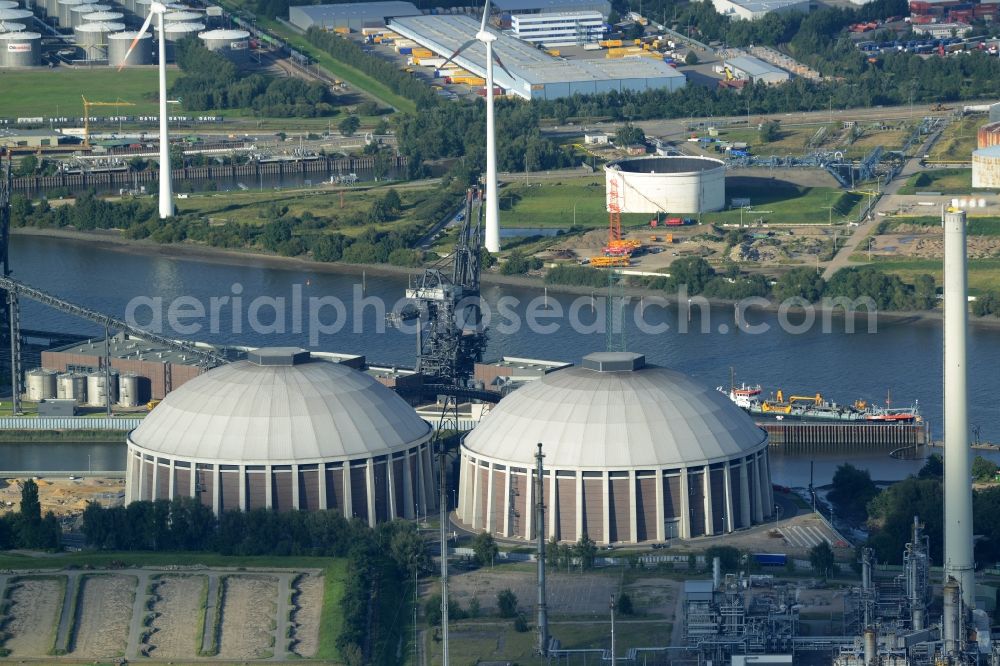 Hamburg from above - Coal power plants of the Vattenfall power plant Moorburg in Hamburg in Germany. The power plant with its domes, silos and technical facilities is located on the riverbank of the Suederelbe