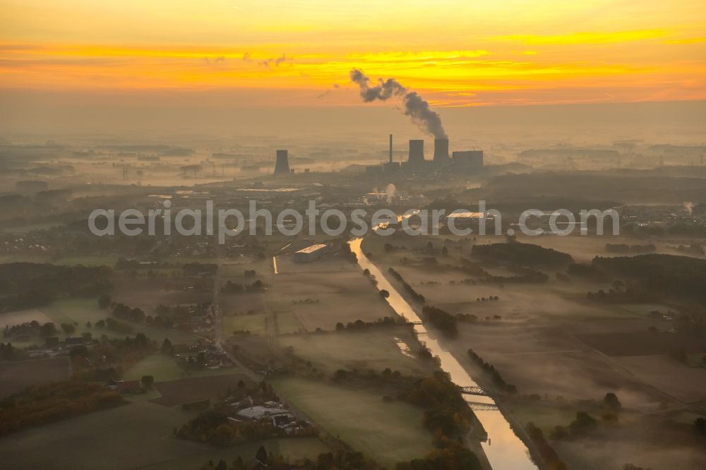 Hamm from above - Coal-fired power plant Westphalia in the sunrise with smoke and cooling towers in Hamm, North Rhine-Westphalia, Germany