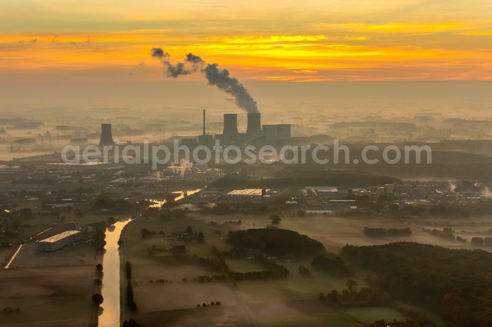 Hamm from the bird's eye view: Coal-fired power plant Westphalia in the sunrise with smoke and cooling towers in Hamm, North Rhine-Westphalia, Germany