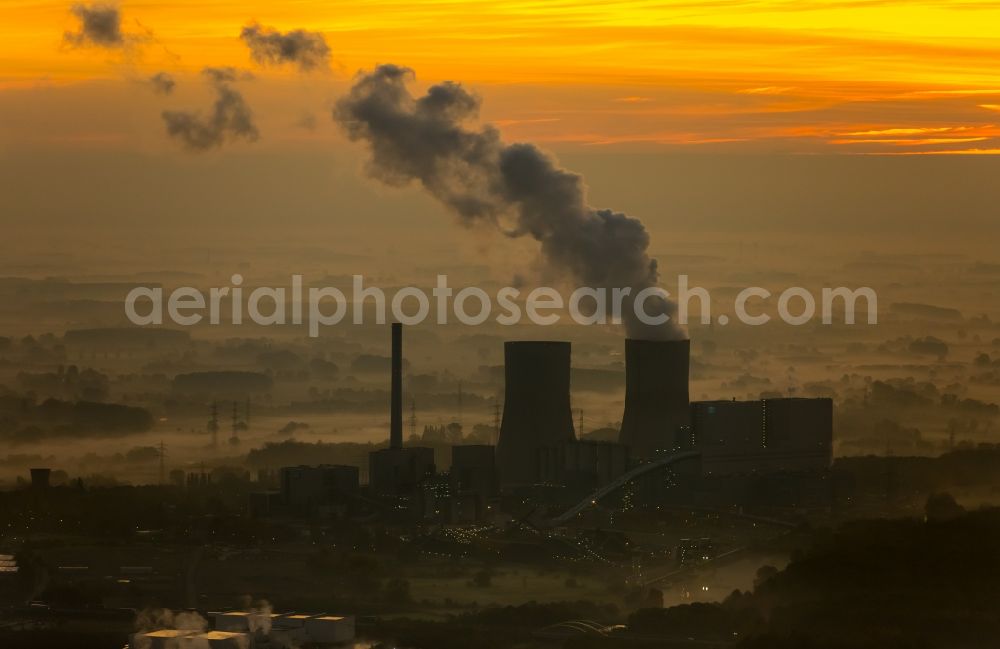 Hamm from the bird's eye view: Coal-fired power plant Westphalia in the sunrise with smoke and cooling towers in Hamm, North Rhine-Westphalia, Germany