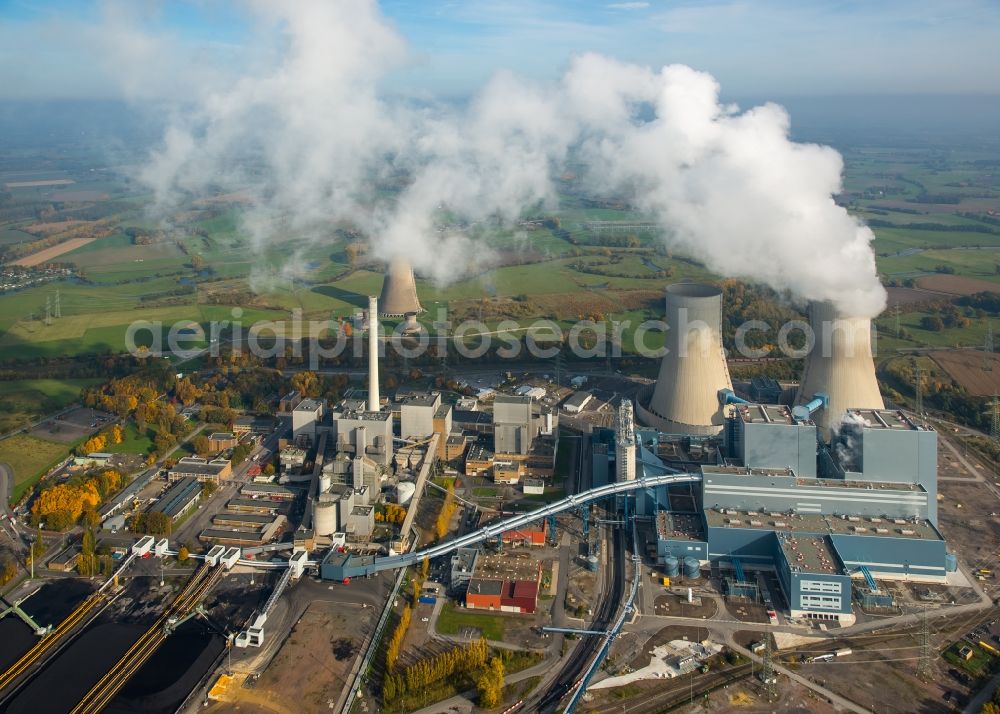 Aerial photograph Hamm - Coal-fired power plant Westphalia in the sunrise with smoke and cooling towers in Hamm in the state of North Rhine-Westphalia