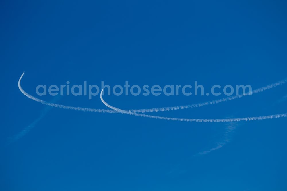 Klink from the bird's eye view: View of condensation trails in the sky over Klink in the state Mecklenburg-West Pomerania