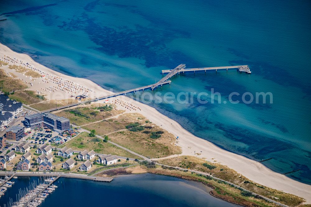 Aerial image Heiligenhafen - Running surfaces and construction of the pier over the water surface . on street Seebrueckenpromenade in Heiligenhafen at the baltic sea coast in the state Schleswig-Holstein, Germany