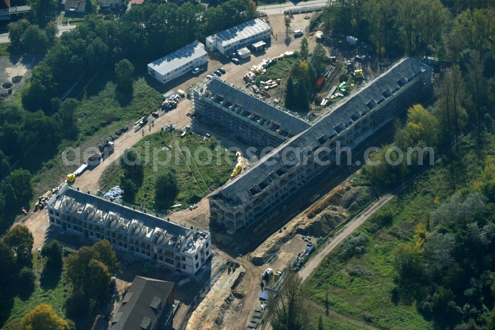 Bernau from the bird's eye view: Construction site for the renovation and reconstruction of the building complex of the former military barracks Sanierungsgebiet Panke-Park on Schoenfelder Weg in Bernau in the state Brandenburg, Germany