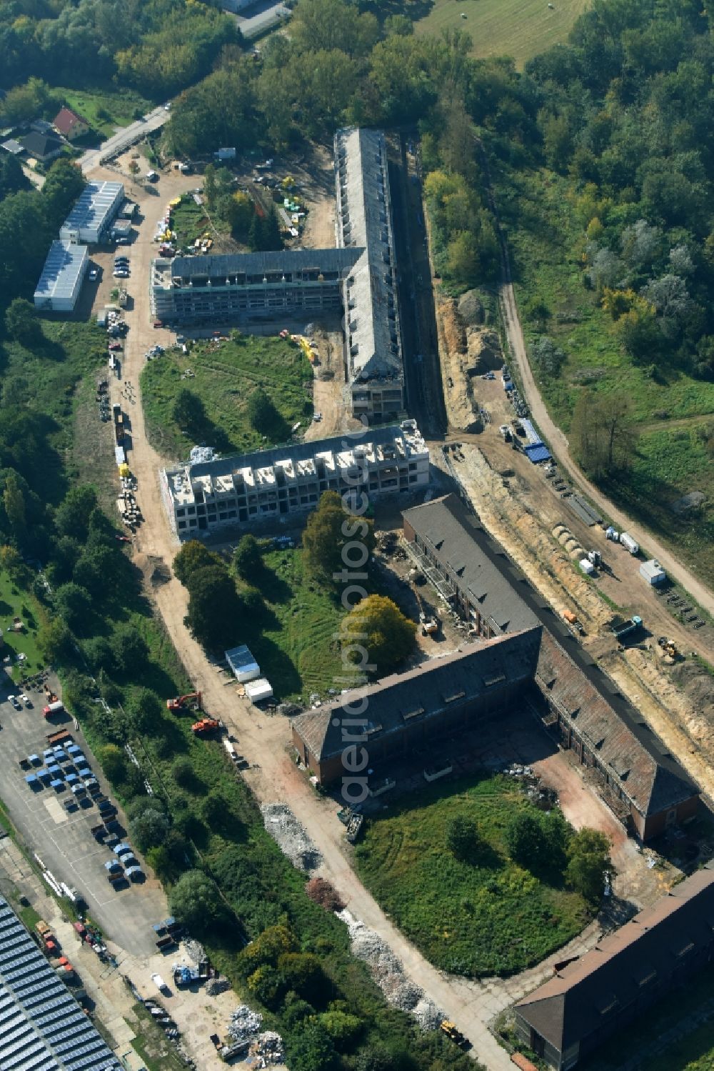 Bernau from above - Construction site for the renovation and reconstruction of the building complex of the former military barracks Sanierungsgebiet Panke-Park on Schoenfelder Weg in Bernau in the state Brandenburg, Germany