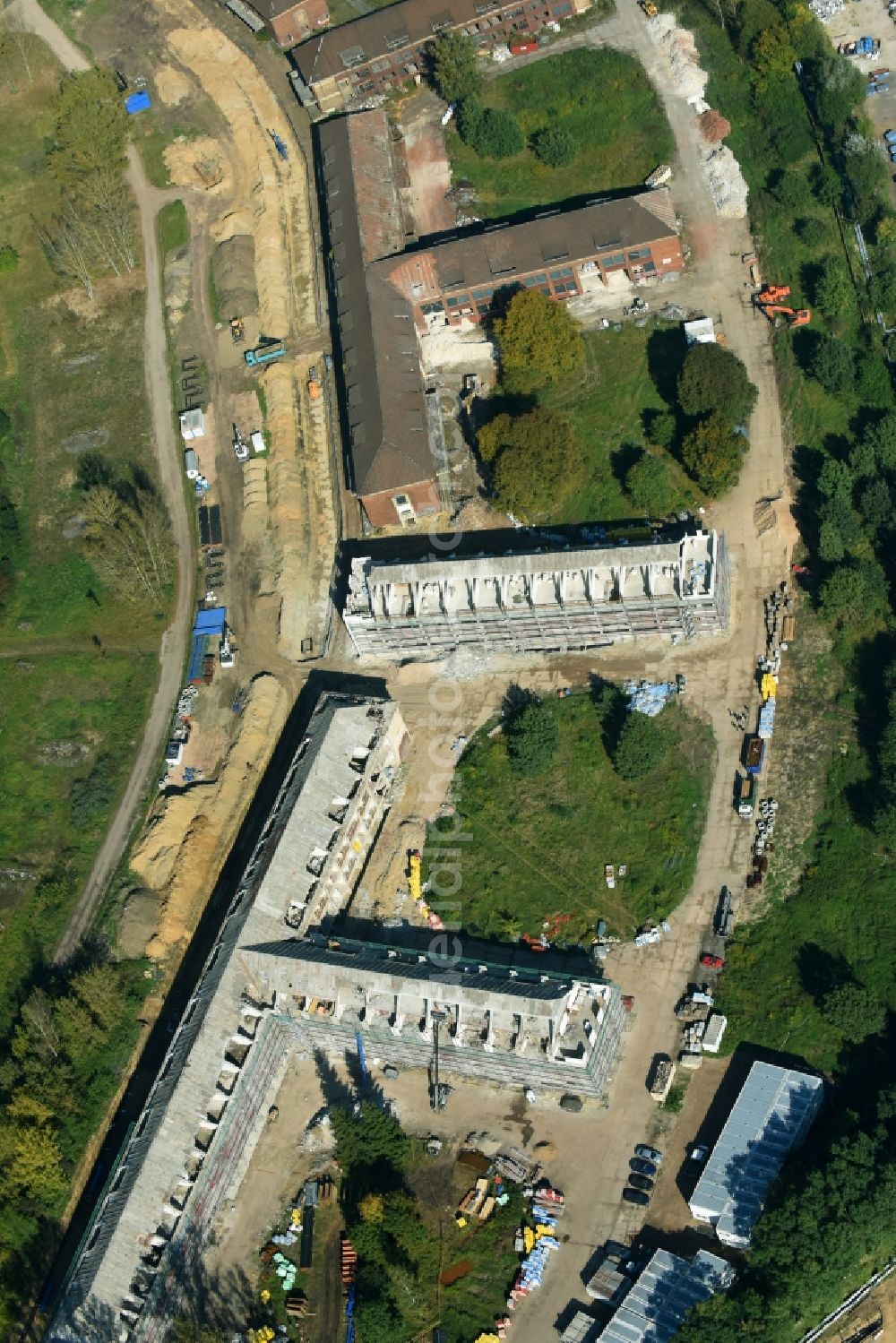 Aerial photograph Bernau - Construction site for the renovation and reconstruction of the building complex of the former military barracks Sanierungsgebiet Panke-Park on Schoenfelder Weg in Bernau in the state Brandenburg, Germany