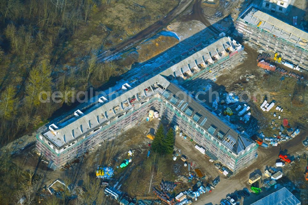 Bernau from the bird's eye view: Construction site for the renovation and reconstruction of the building complex of the former military barracks Sanierungsgebiet Panke-Park on Schoenfelder Weg in Bernau in the state Brandenburg, Germany