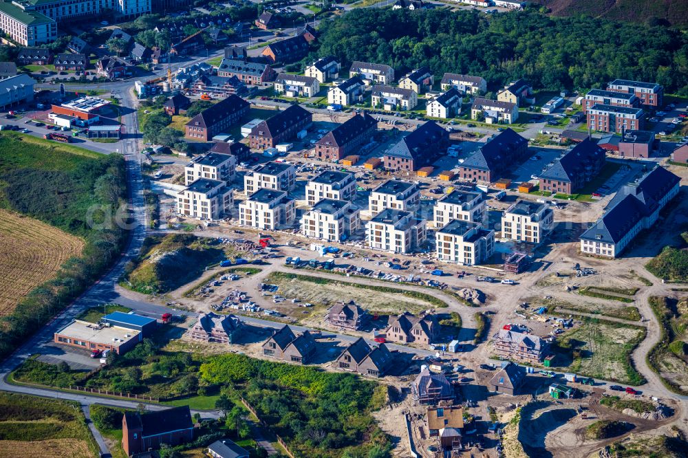 List from above - Construction site for the renovation and reconstruction of the building complex of the former military barracks List Duenenpark on street Querduenenpfad in List on the island of Sylt in the state Schleswig-Holstein, Germany